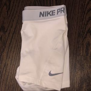 White nike pros